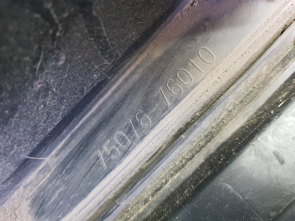 307023