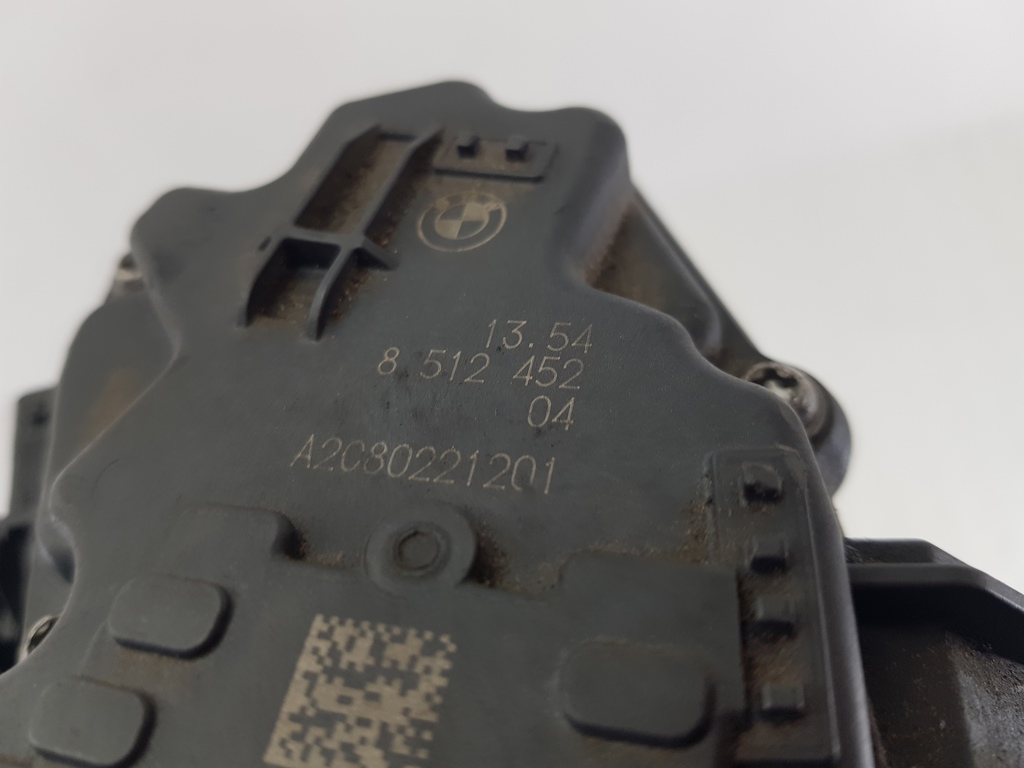 308571