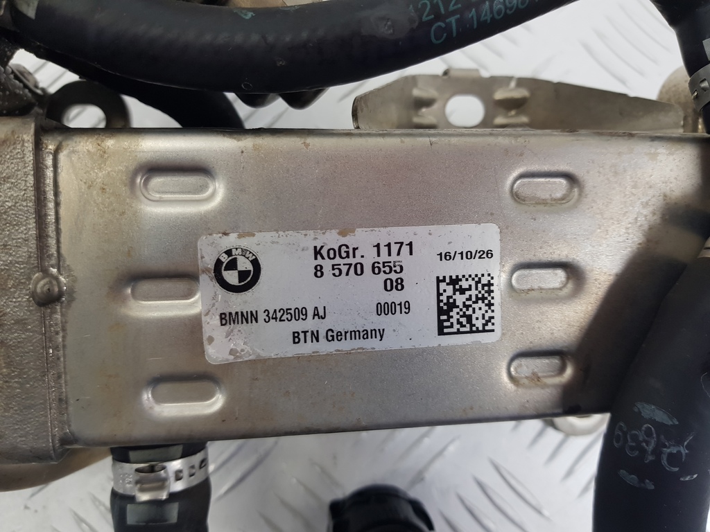 308573