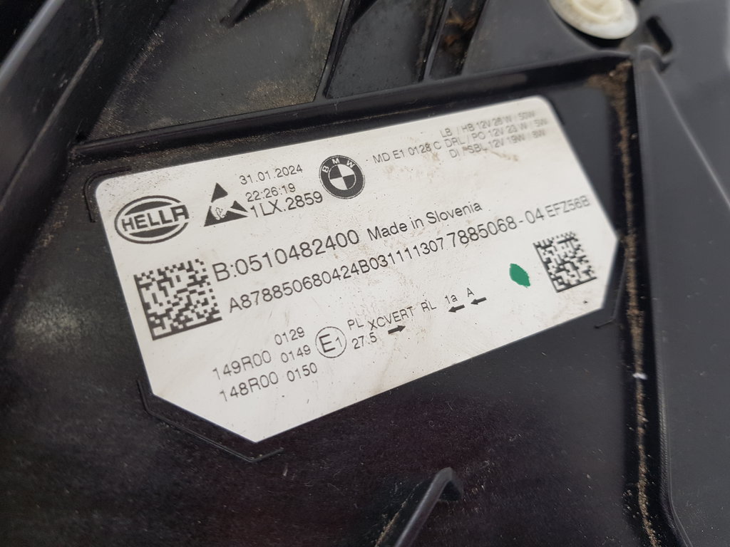 323129